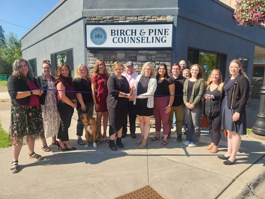 The Birch and Pine Counseling team at the office entrance